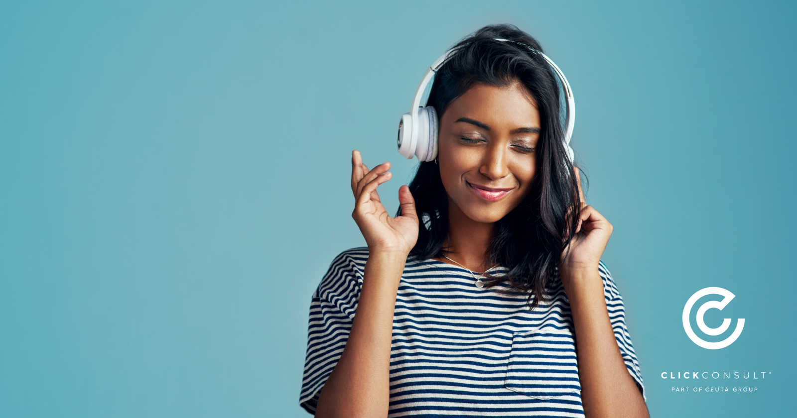 Woman with headphones listening to music