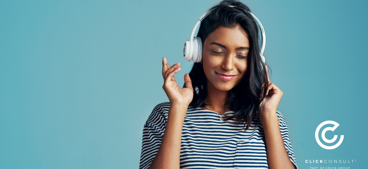 Woman with headphones listening to music