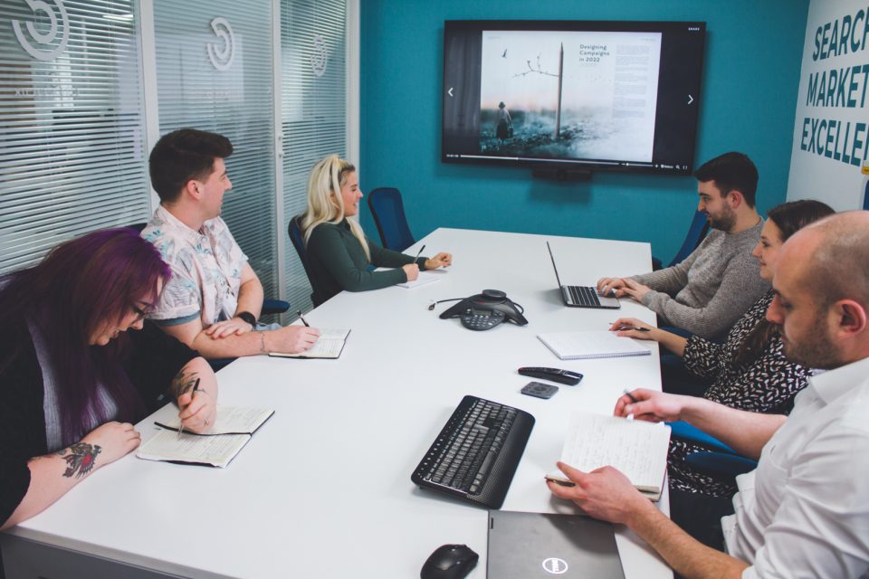 click consult staff discussion in conference room